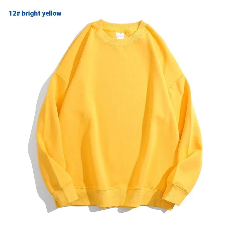 Women's loose fit cotton off shoulder sweater in a solid colour with round neck and long sleeves.