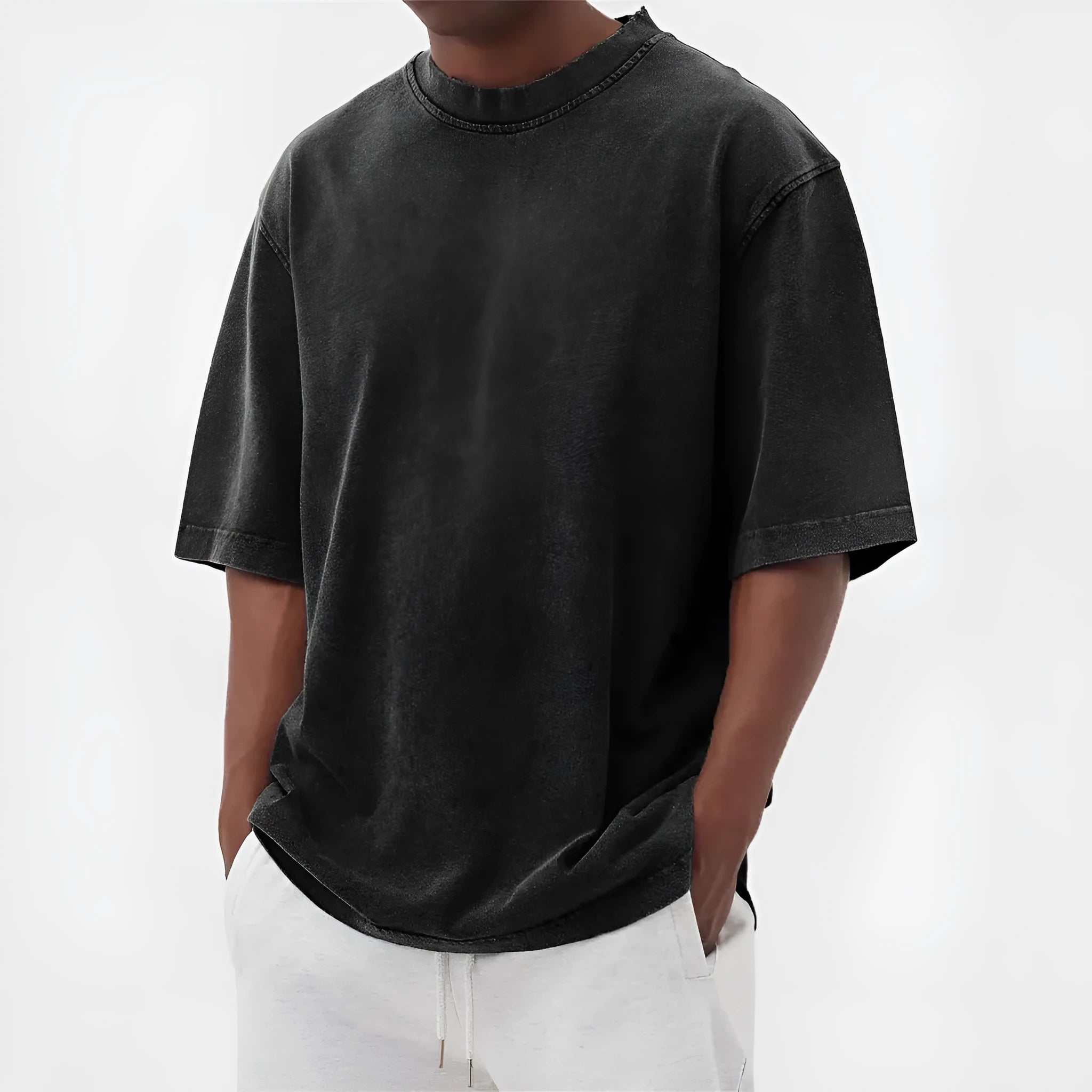 Men's loose fit pullover T-shirt in a stone-washed distressed solid colour, shown in army green.