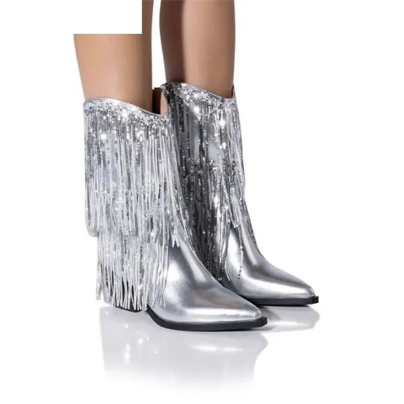 Women's black chunky heel tassel ankle boots with a super-high stiletto heel on a white background.