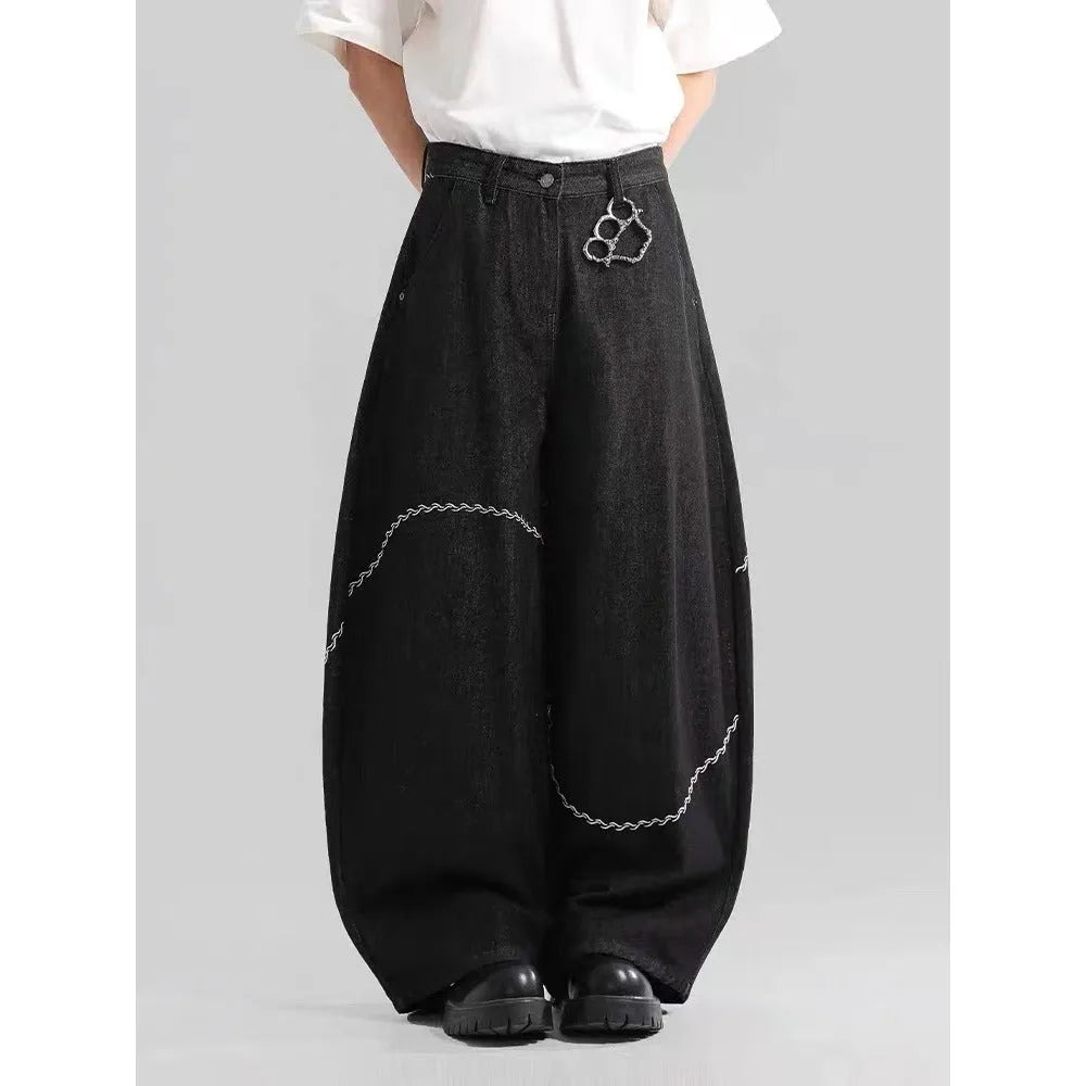 Men's black straight-leg jeans with a mid waist and zip fly, shown laid flat.