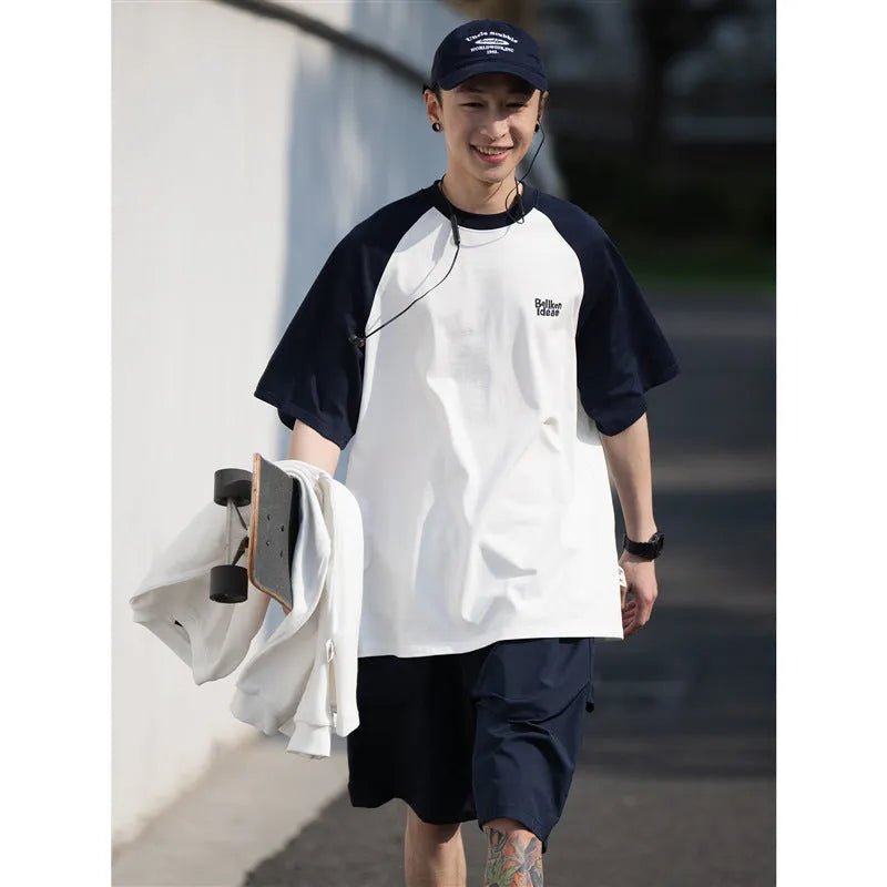 Men's blue casual raglan sleeve T-shirt with loose fit and pullover style