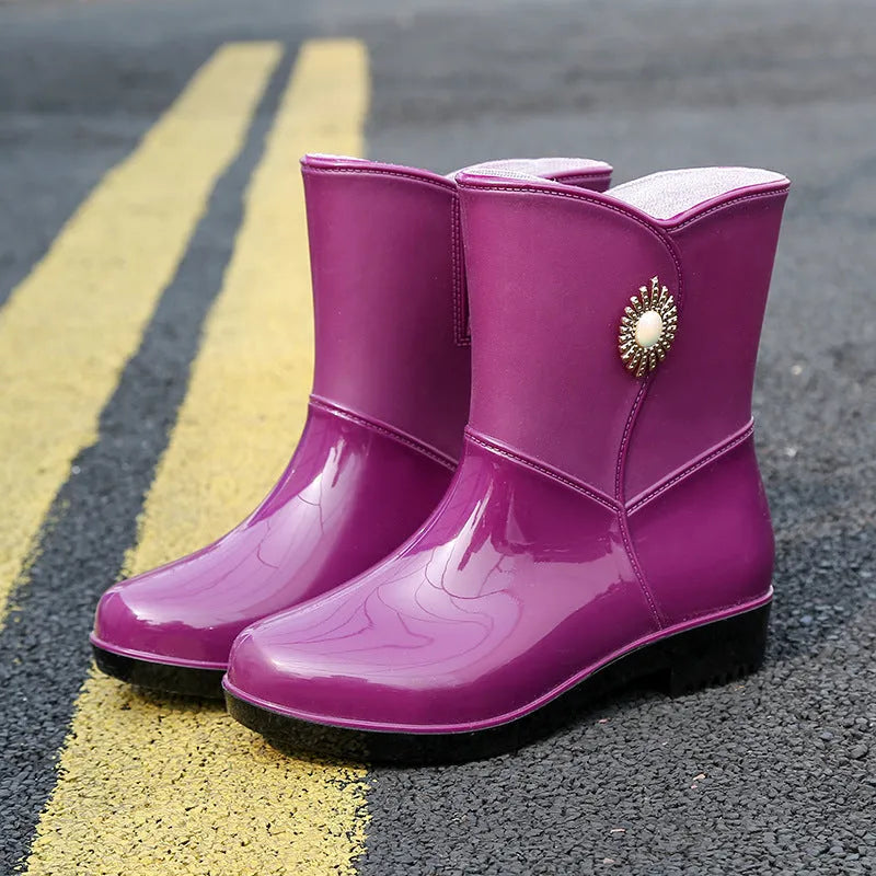Women's middle tube rain boots in purple, black, and beige colours with non-slip soles