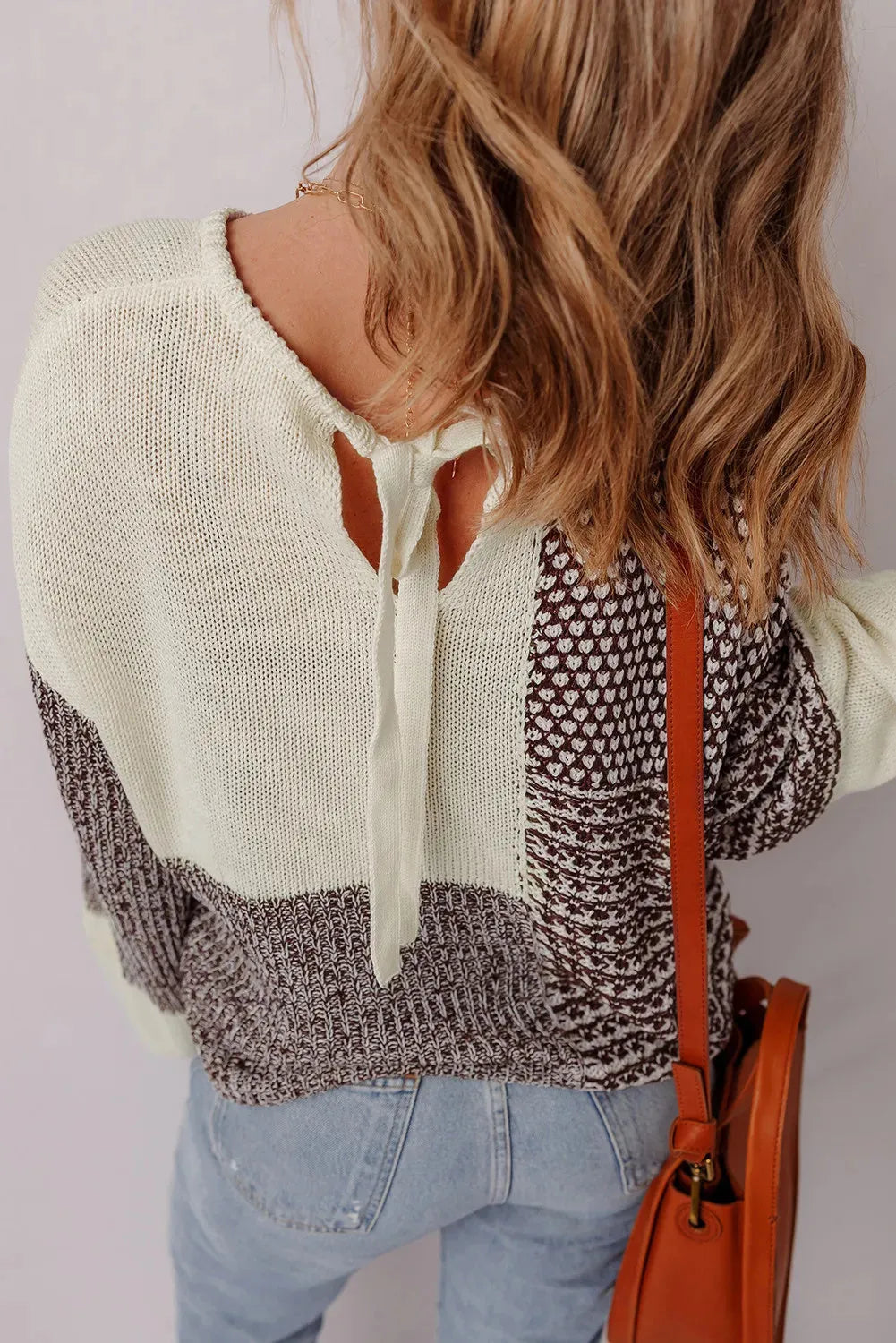 Dark khaki colour block loose sweater with back tie and drop shoulders.