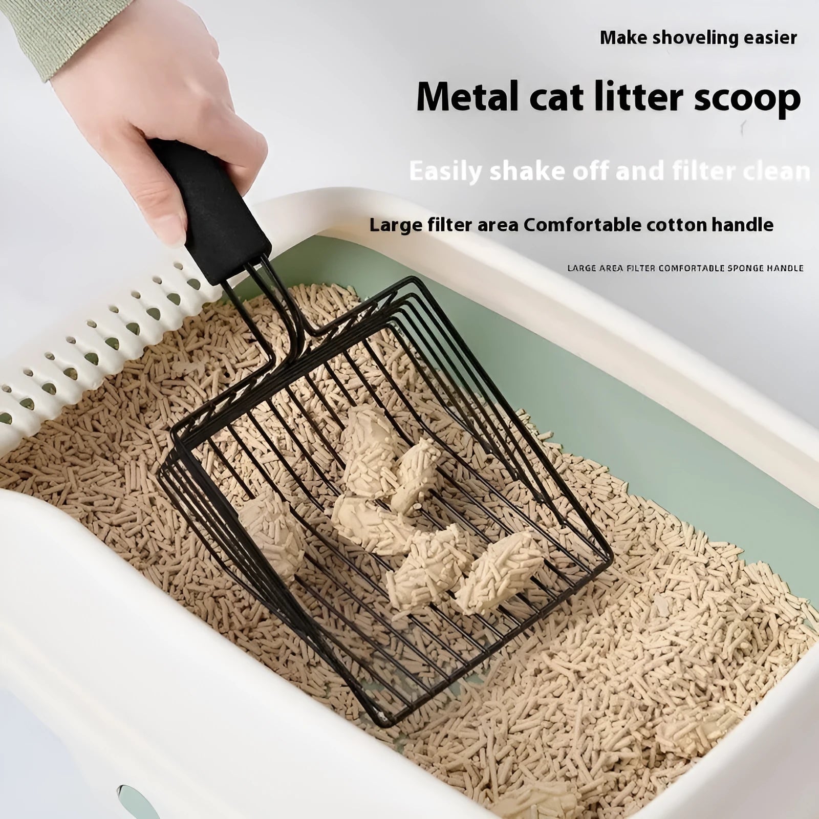 Black metal cat litter scoop with narrow sifting tines
