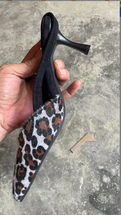 Women's leopard print suede sandals with scattered pointed toe design shown from side view