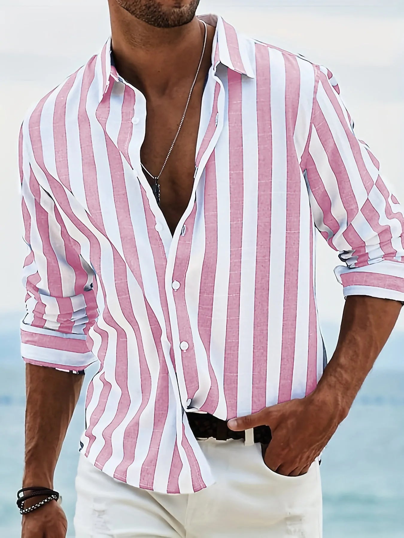 Men's loose striped long-sleeved cardigan shirt in British style on a hanger