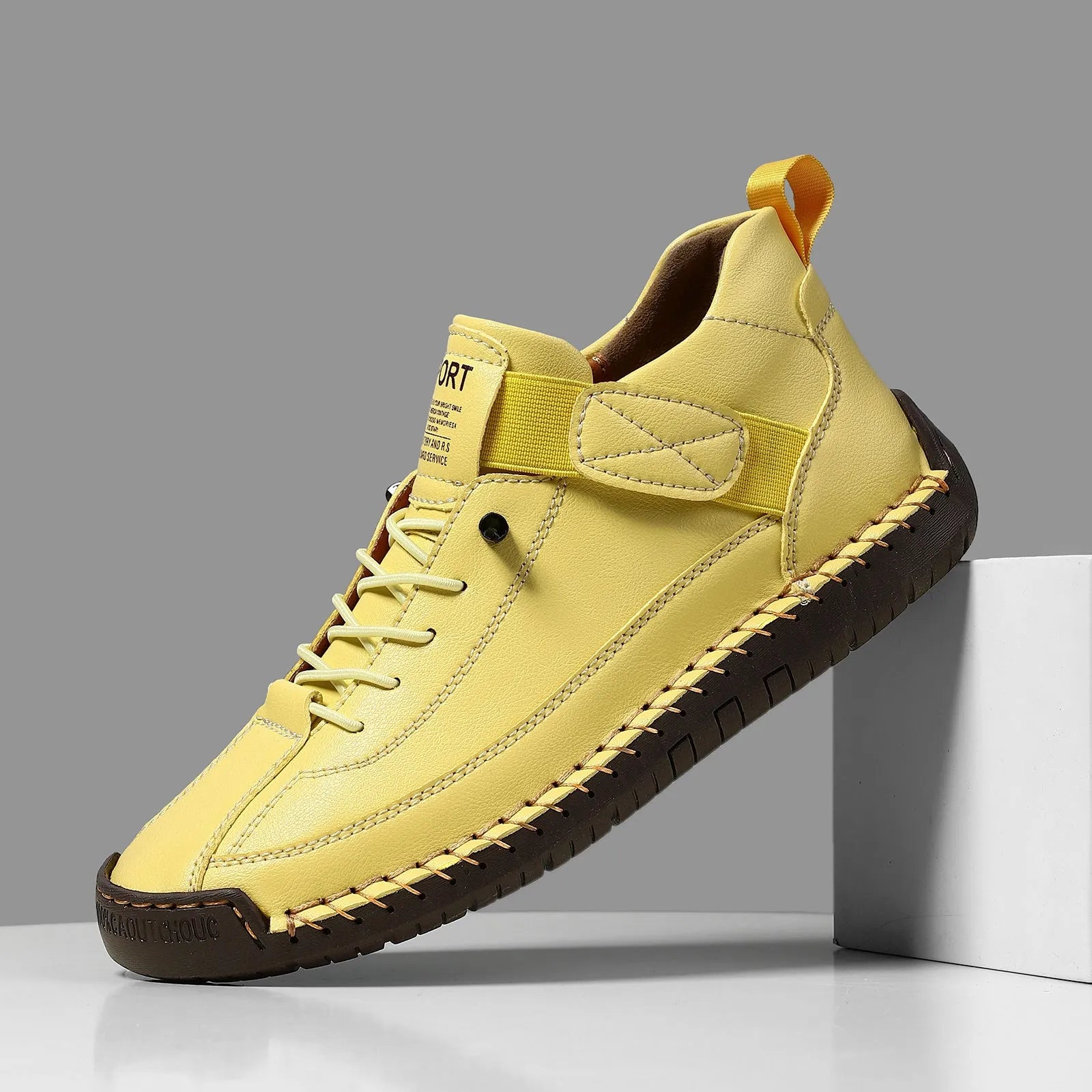 Men's mid-top Martin boot in a solid colour with elastic band and round toe.