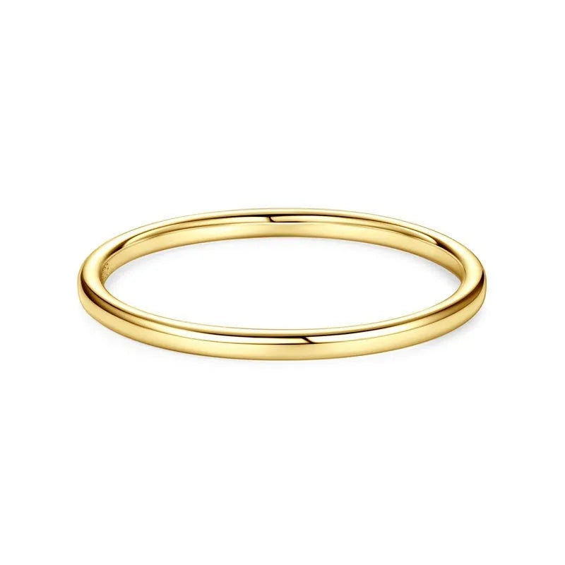 Geometric round bracelet ring in sterling silver, gold, or platinum finish on a jewellery display.