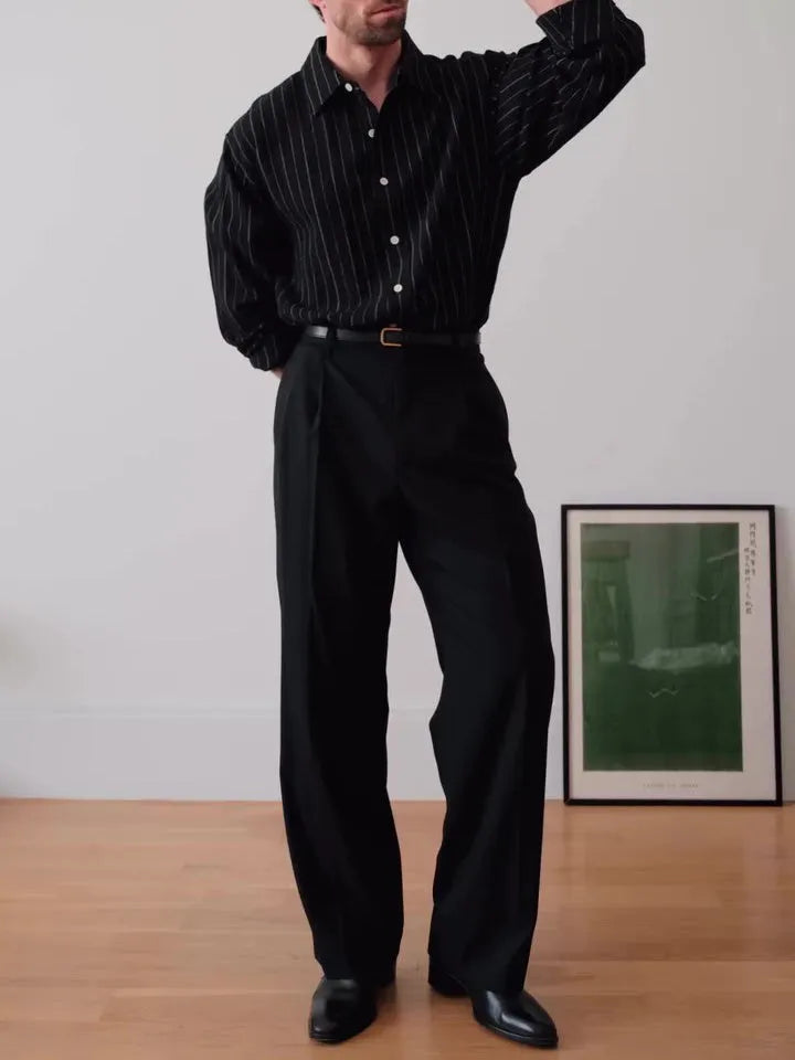 Black pinstriped button-down shirt on hanger showing regular fit and classic striped pattern