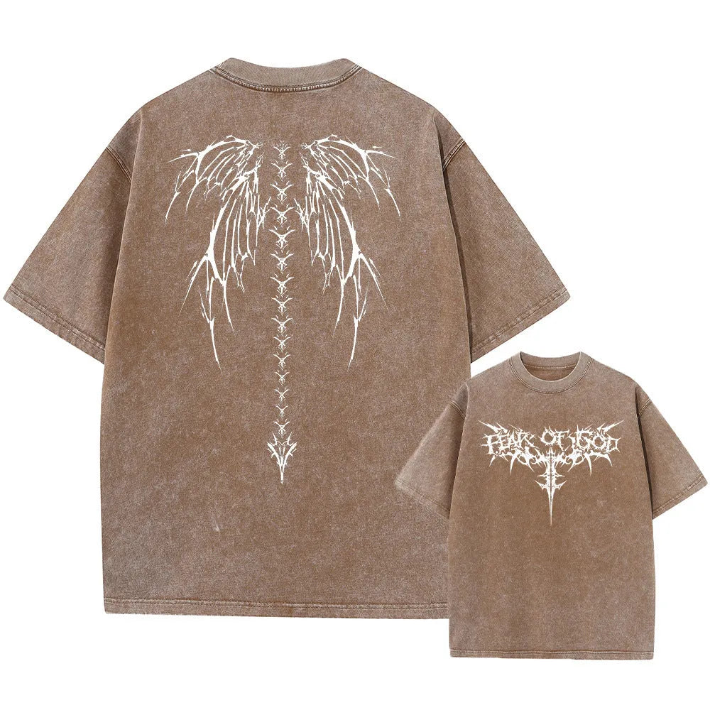 A man's oversized loose fit cotton t-shirt with drop-shoulder short sleeves in a solid colour.