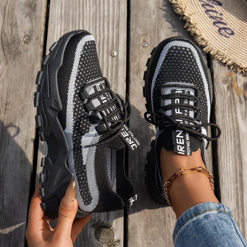 Women's Flyknit mesh lace-up sneakers in multiple colour options with rubber sole