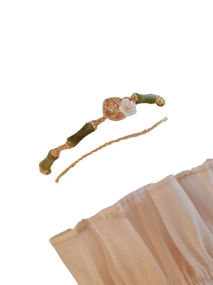 Natural olivine double layer bracelet with Bells of Ireland charms and olive branch detailing