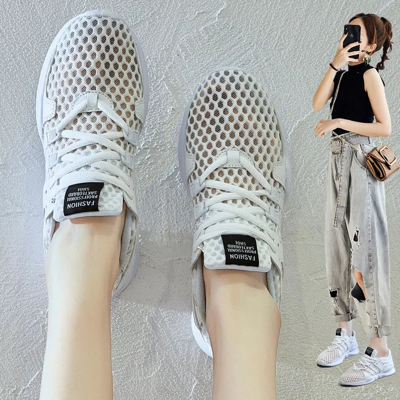 Low-top casual sneaker with mesh hollow-out upper and flat EVA sole in white.