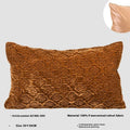 Brown gold antique-style three-dimensional quilted cushion pillow on a sofa