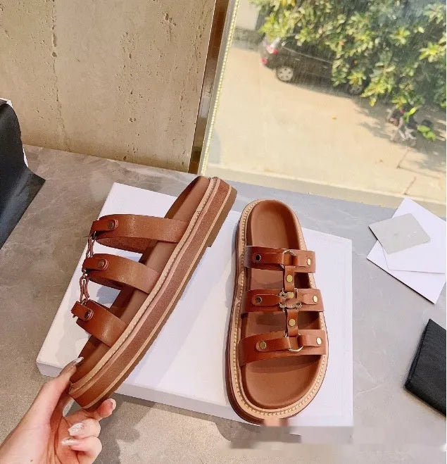 Women's brown retro Roman style sandal slippers with a sheepskin upper and patent leather finish.