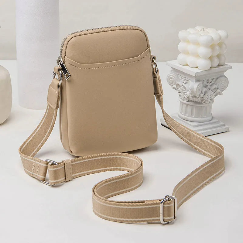 Small solid-colour PU crossbody shoulder bag for mobile phone.