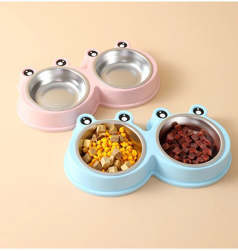 A stainless steel pet bowl with two compartments for water and food, shown in blue.