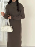 Half turtleneck knitted dress in solid colour with high waist and knee-length design