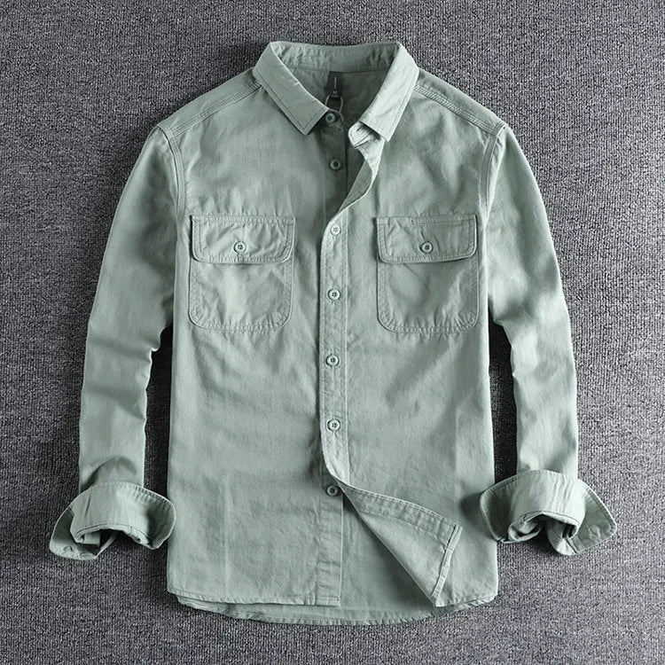 Men's loose long sleeve polyester shirt in cardigan style on a hanger, shown in light grey colour