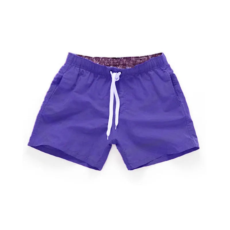 Men's straight leg beach shorts in polyester fabric available in multiple colours and sizes S to 4XL