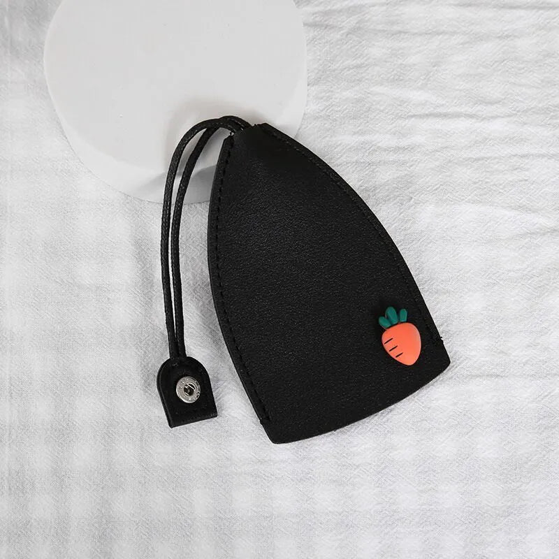 Cartoon pull-out key case in PU leather with colourful design, showing compact 14cm by 7.5cm dimensions