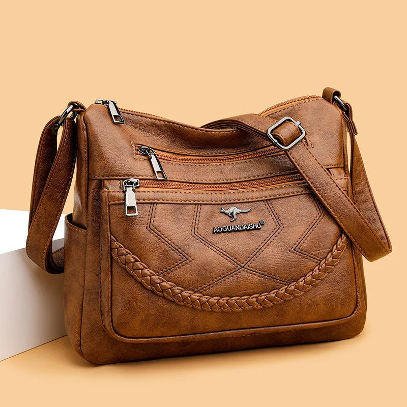 Soft PU leather women's shoulder bag in horizontal square design with crossbody strap