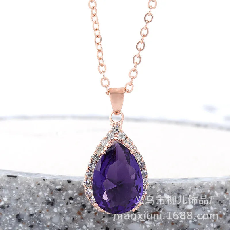 Rose gold pink drop shape women's necklace with geometric rhinestone detailing and alloy construction