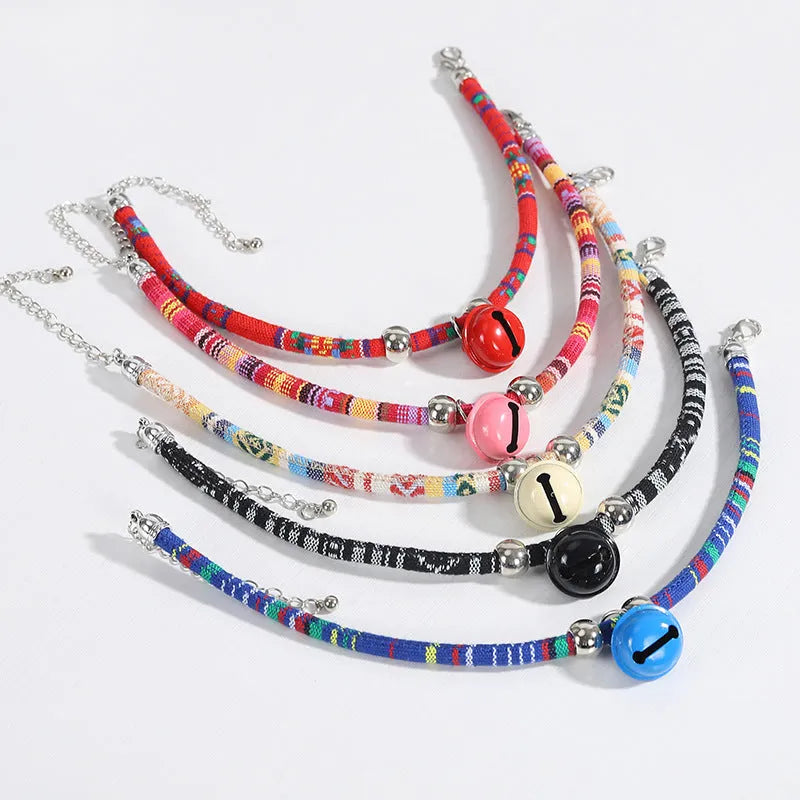 Ethnic pattern pet collar with bell feature for cats and dogs in various colours