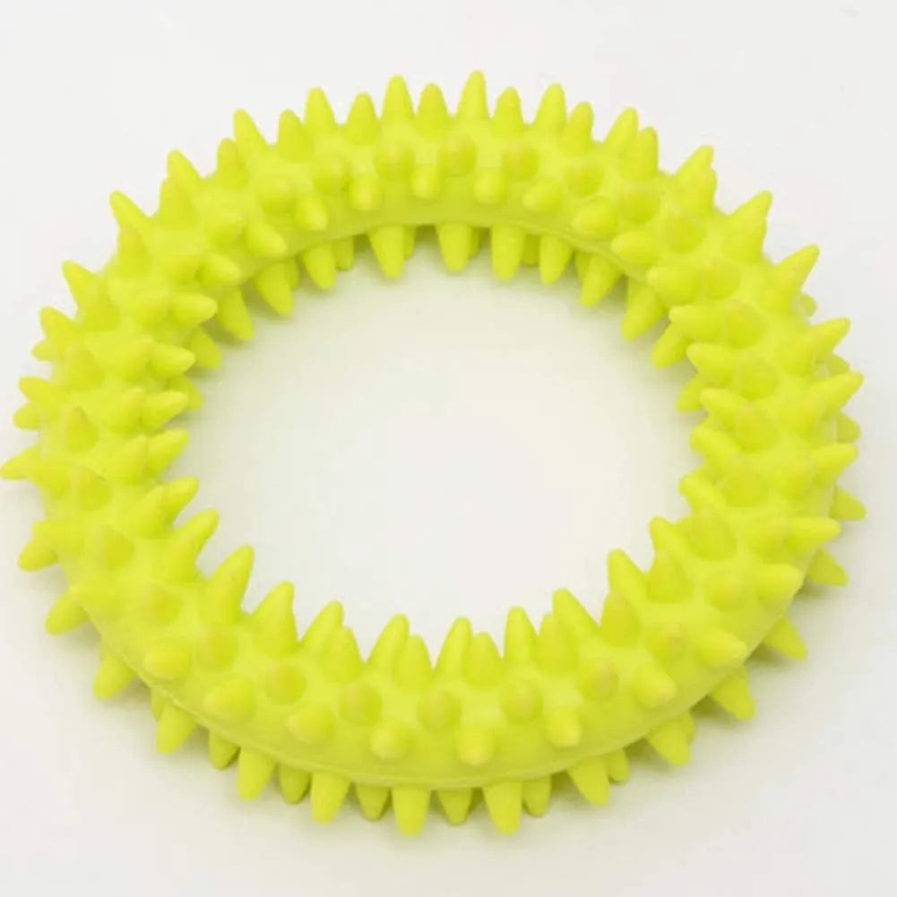 Blue TPR spiky ring dog chew toy with dental cleaning nubs on a white background
