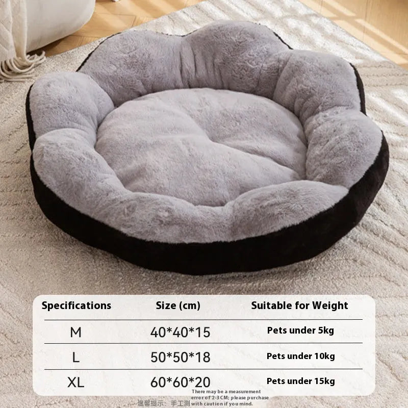 Round rabbit plush cat bed with a detachable cover in a grey and black colour.