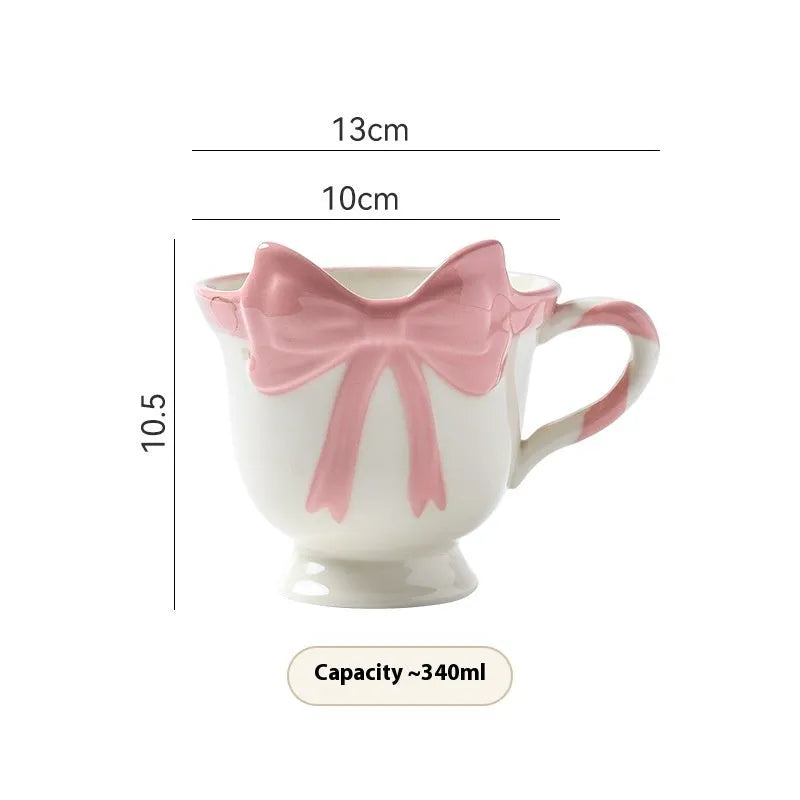 Ceramic heart bow mug with 301-400ml capacity in black pink or white powder colour