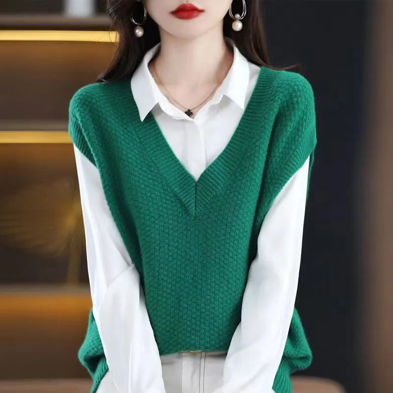 Sleeveless pullover vest with 3D knit pattern in creamy-white colour, shown on hanger