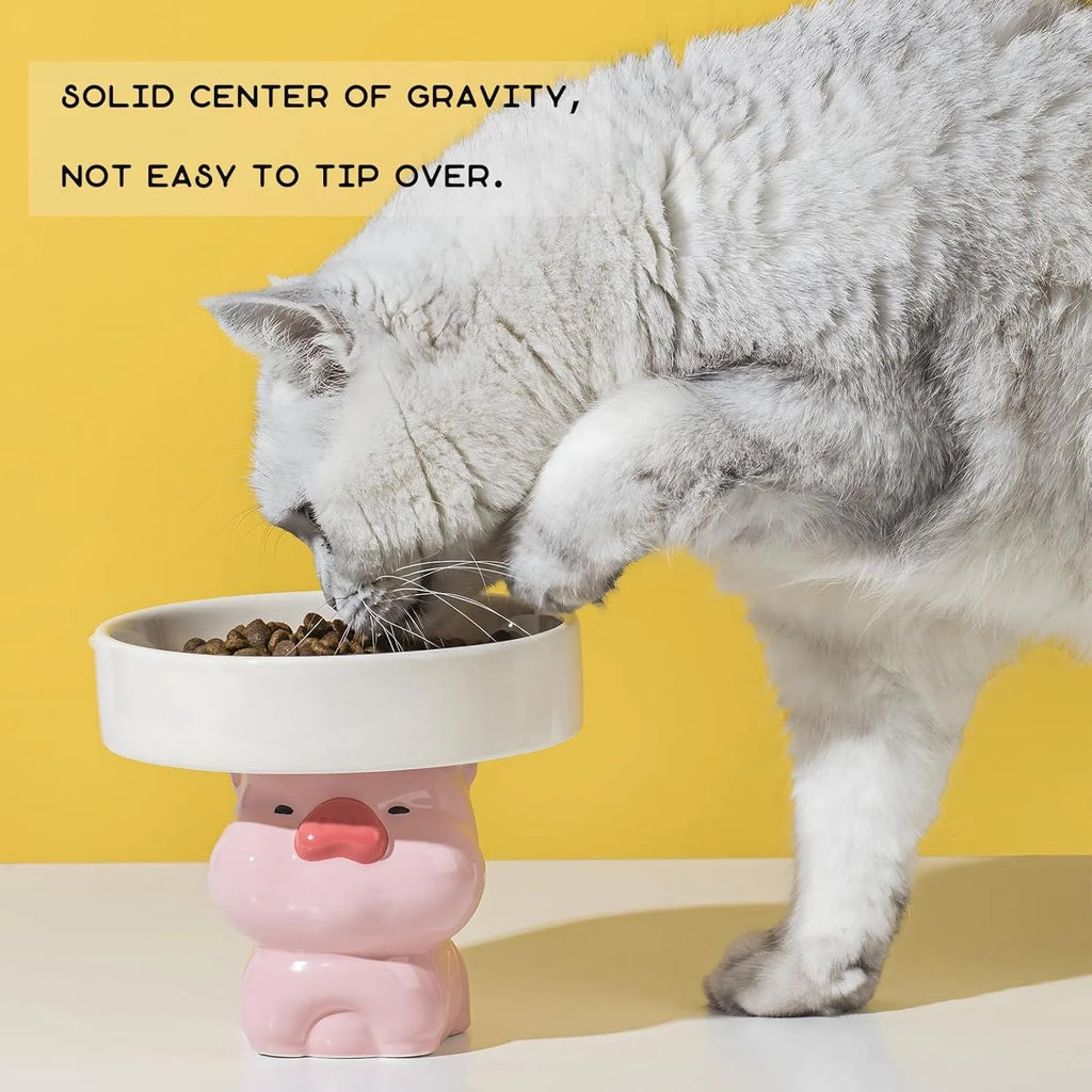 Raised ceramic cat bowl in animal design with wide opening for whisker-friendly feeding
