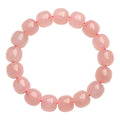 Pink crystal barrel bead bracelet with geometric shaped 8-10mm beads