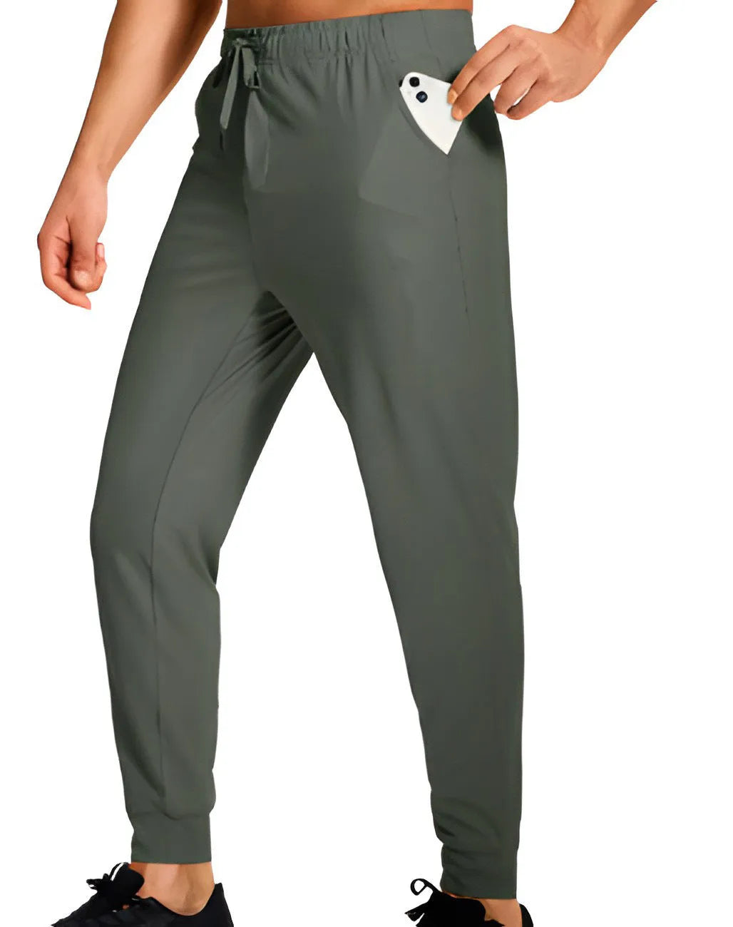 Men's loose-fit solid colour casual trousers on a hanger, showing the relaxed leg cut.