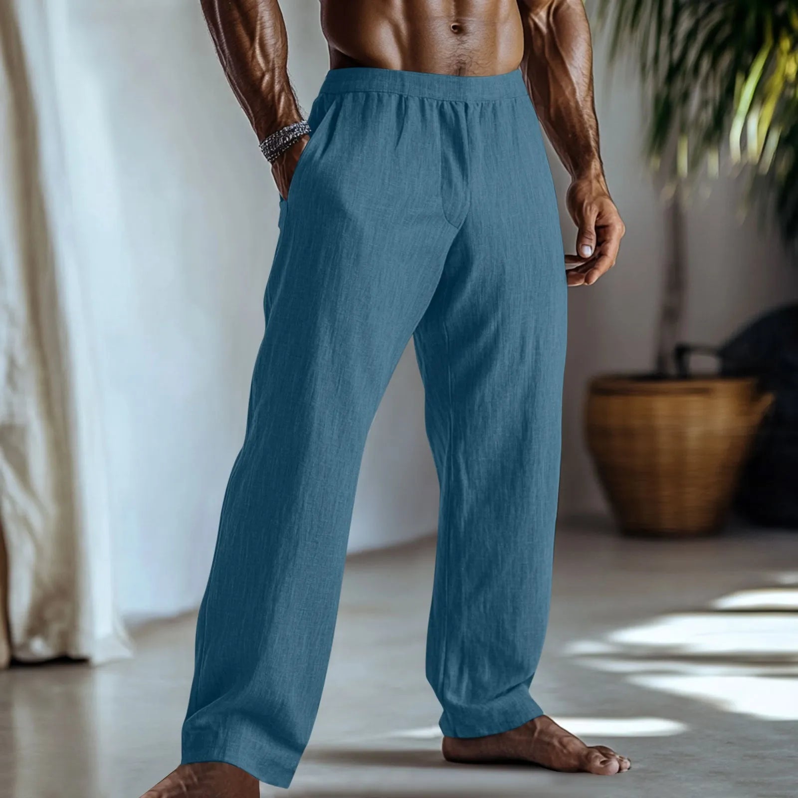 Straight-leg casual trousers in cotton and linen fabric, shown in a light green colour with visible side pockets.