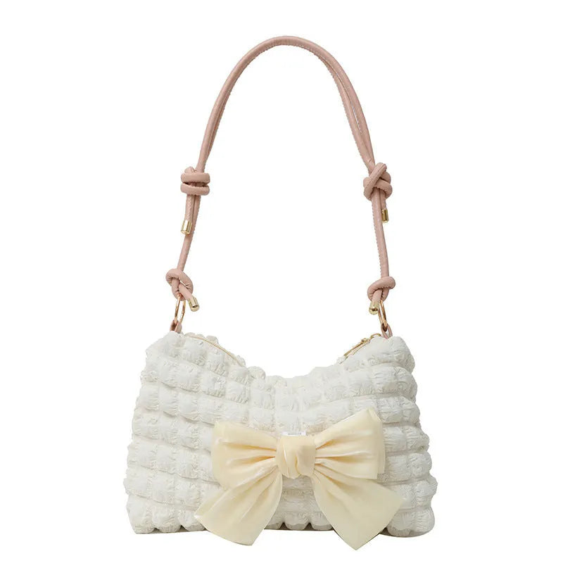 Women's canvas shoulder bag in street style with sandwich pocket and phone compartment in horizontal square shape