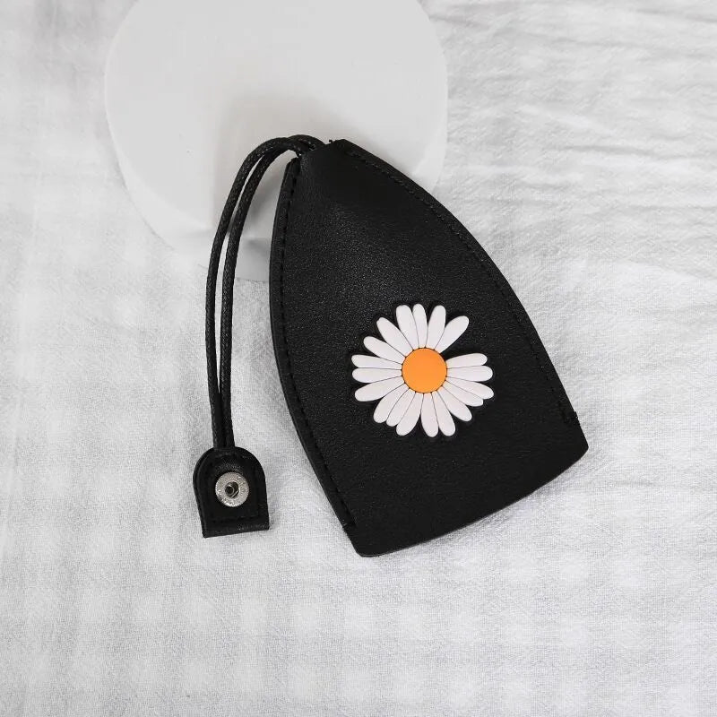 Cartoon pull-out key case in PU leather with colourful design, showing compact 14cm by 7.5cm dimensions