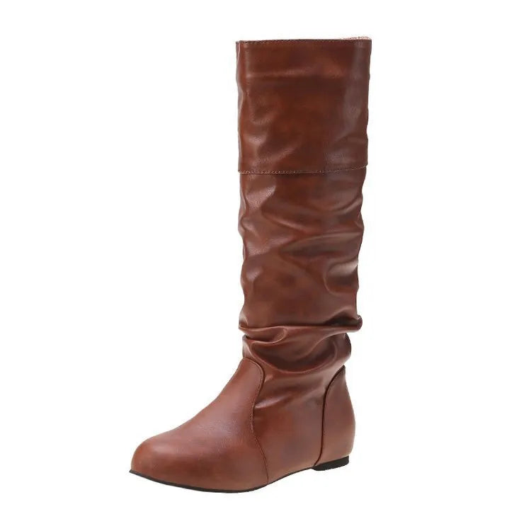 Women's slip-on flat ankle boots in artificial PU leather with high shaft and rubber sole