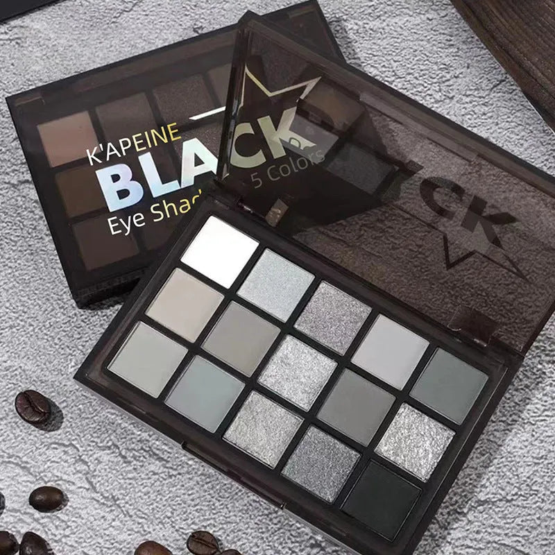 Matte eyeshadow palette showing fifteen colours in brown and blue shades with shimmer finishes