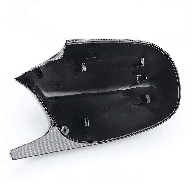 Pair of black and carbon pattern ABS plastic rearview mirror shells for BMW 3 Series E90.