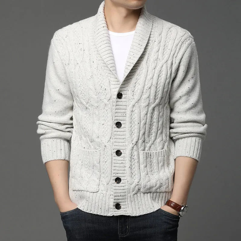 Man wearing a grey Korean style jacquard patterned knitted cardigan jacket.