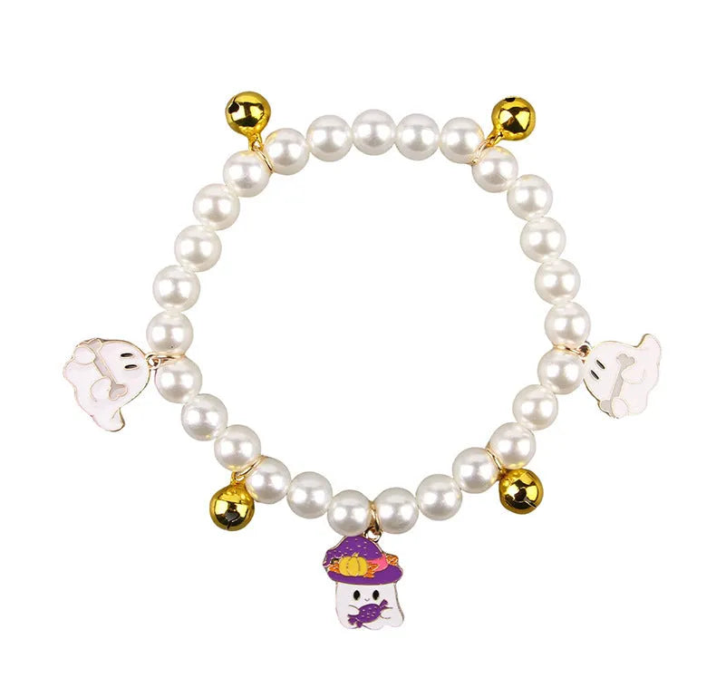 Purple simulated pearl Halloween cat collar decoration with a choice of ghost or pumpkin pendants.