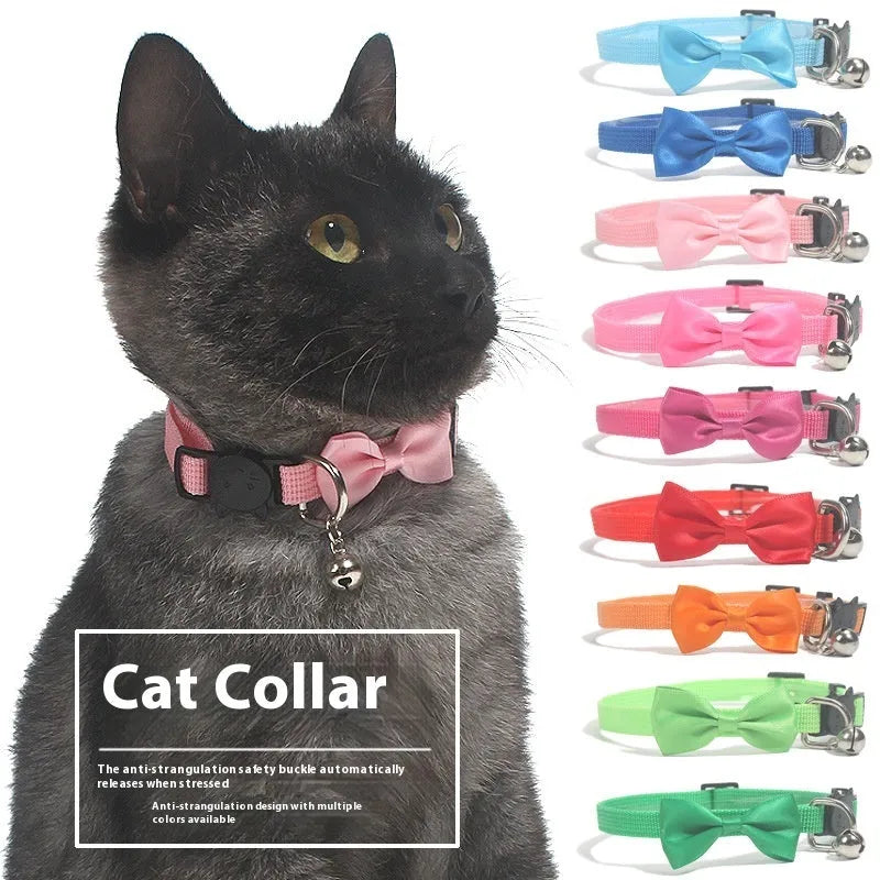 Adjustable nylon cat collar with decorative bow and bell in multiple colour options including red, blue, pink and green