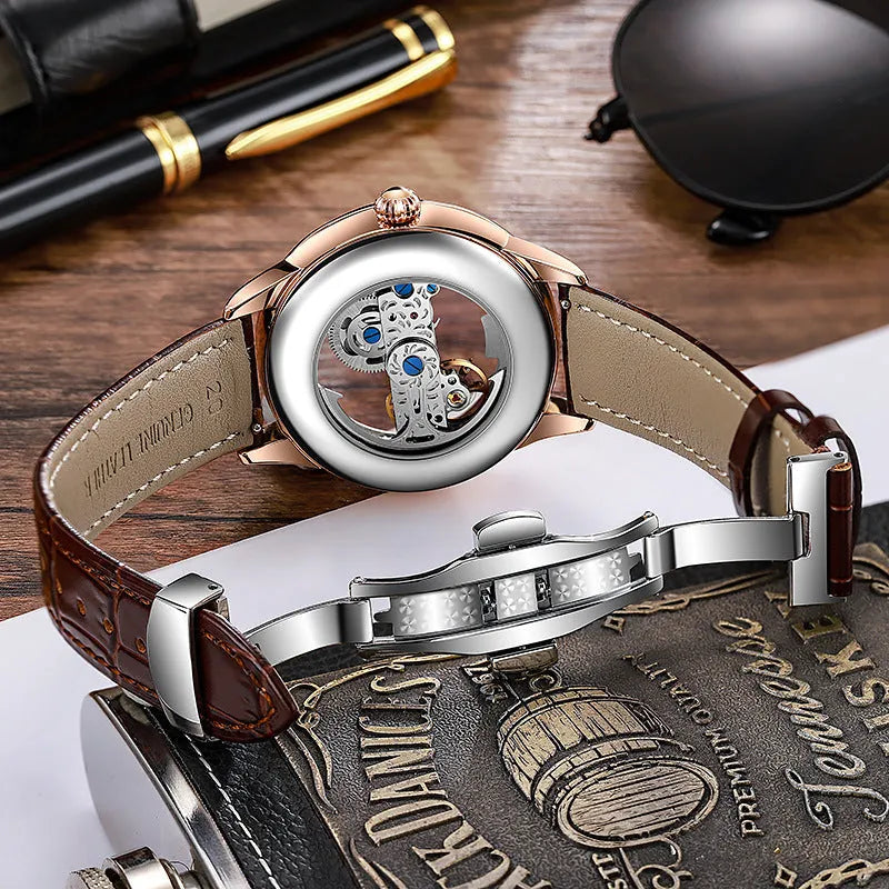 Men's rose gold stainless steel mechanical watch with transparent case back on wrist