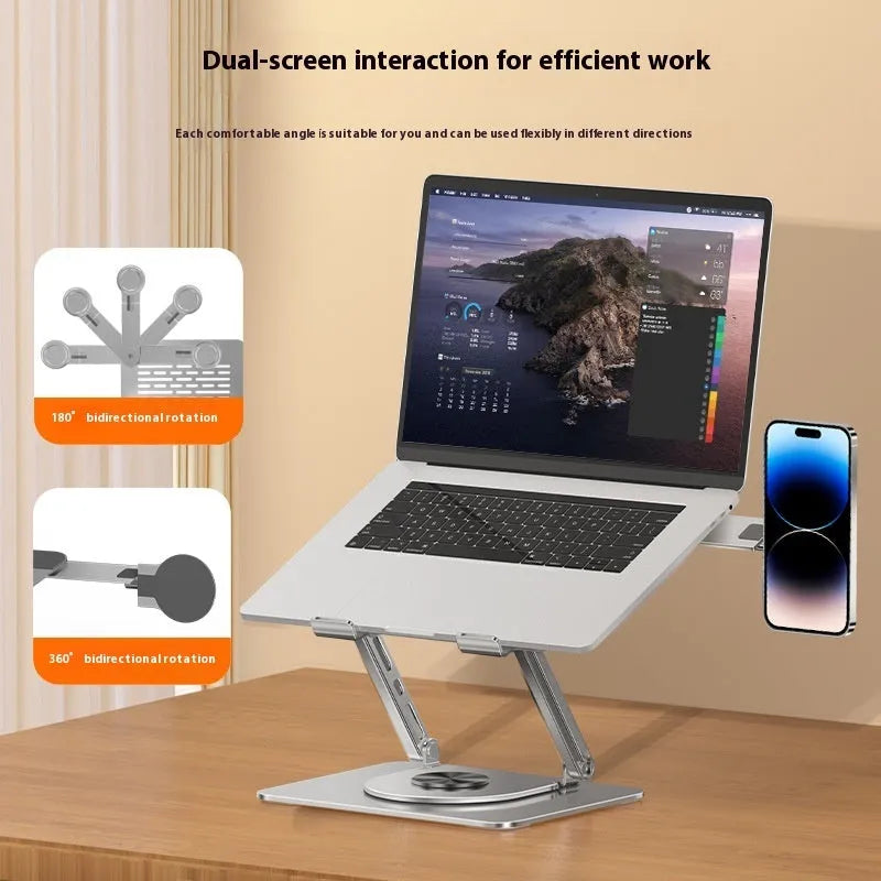 Silver carbon steel laptop stand with 360-degree rotation and a side-mounted magnetic phone holder.