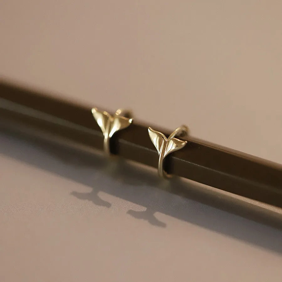 Gold plated fishtail earrings with S925 sterling silver construction and 8-10mm diameter