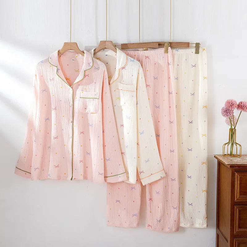Women's cotton pajama set with long sleeves in lightweight crepe fabric, shown in pink colour