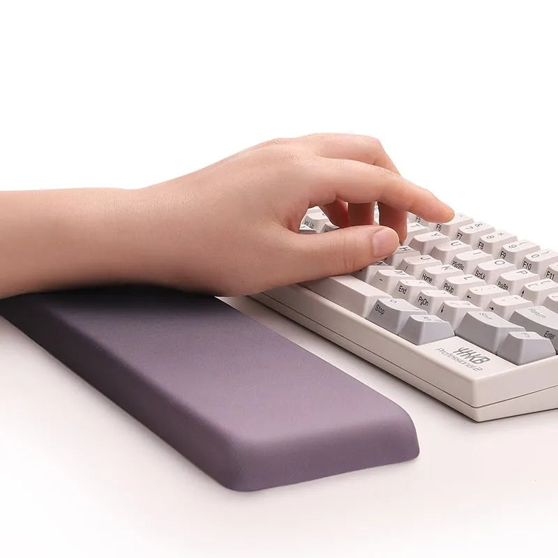 Square silica gel wrist rest mouse pad with strap on a desk, 250mm by 180mm, cloth surface