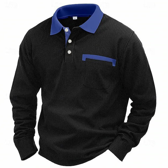 Man modelling a loose-fit long sleeve polo shirt with a waffle-texture fabric in a solid colour.